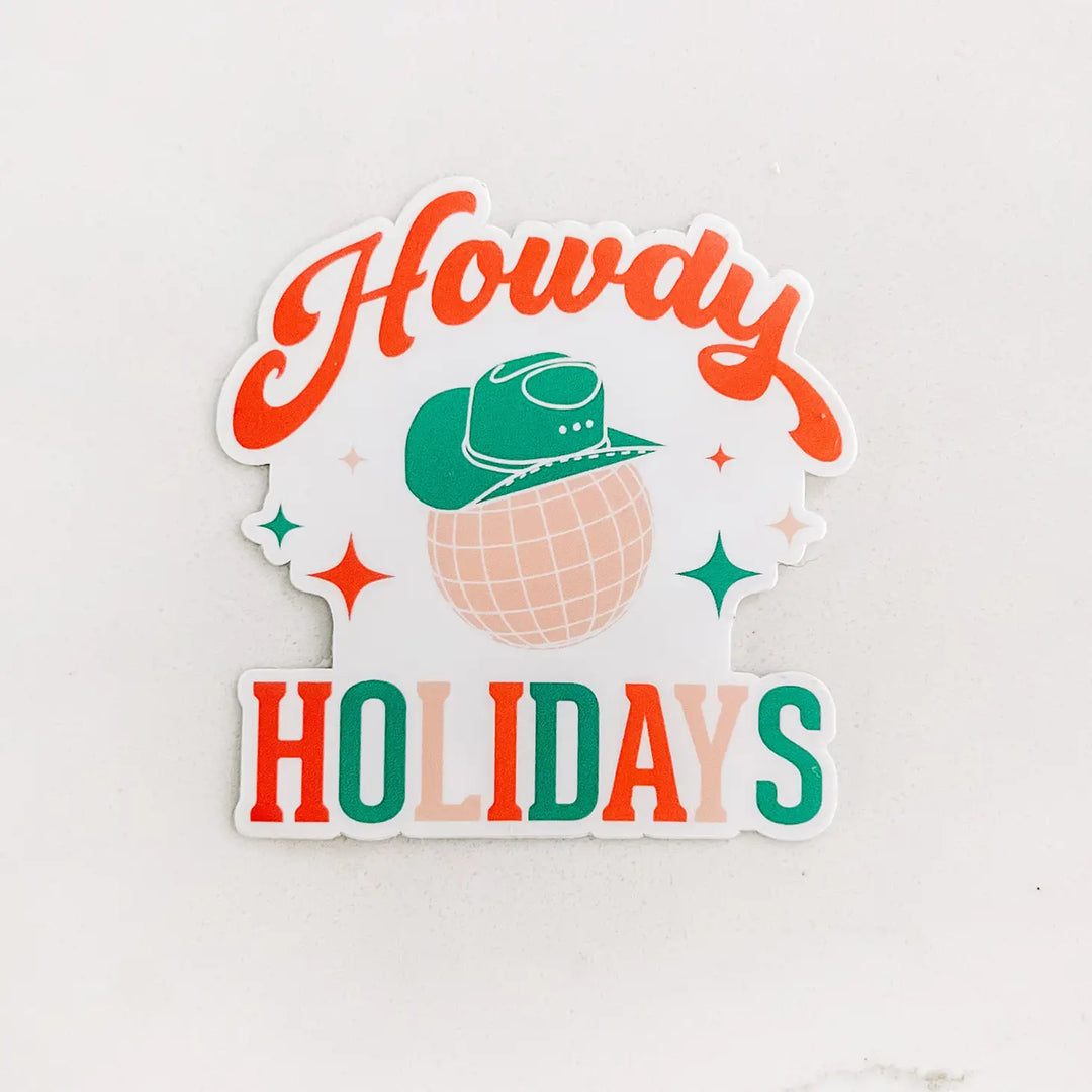 Howdy Holidays Sticker with a disco ball and cowboy hat
