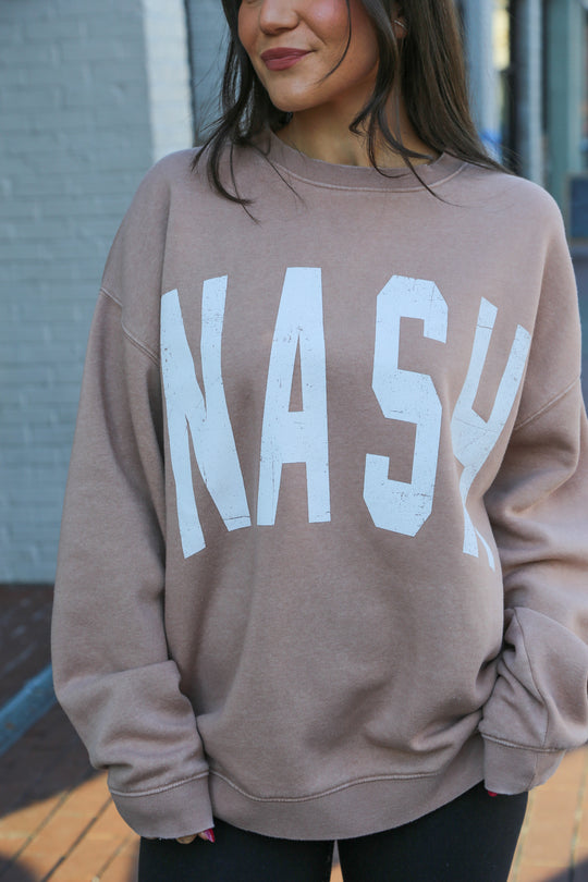 Light Tan/Taupe oversized vintage wash crewneck with oversized ‘nash’ screen printed on the front 