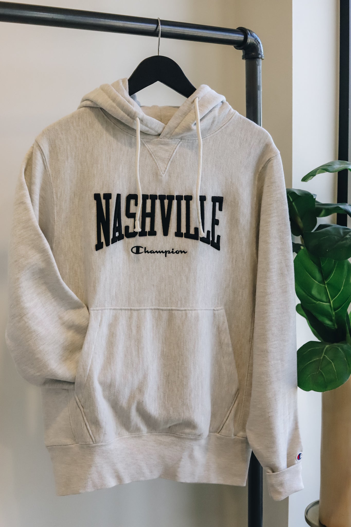 Hanging photo of the champion embroidered nashville hoodie 