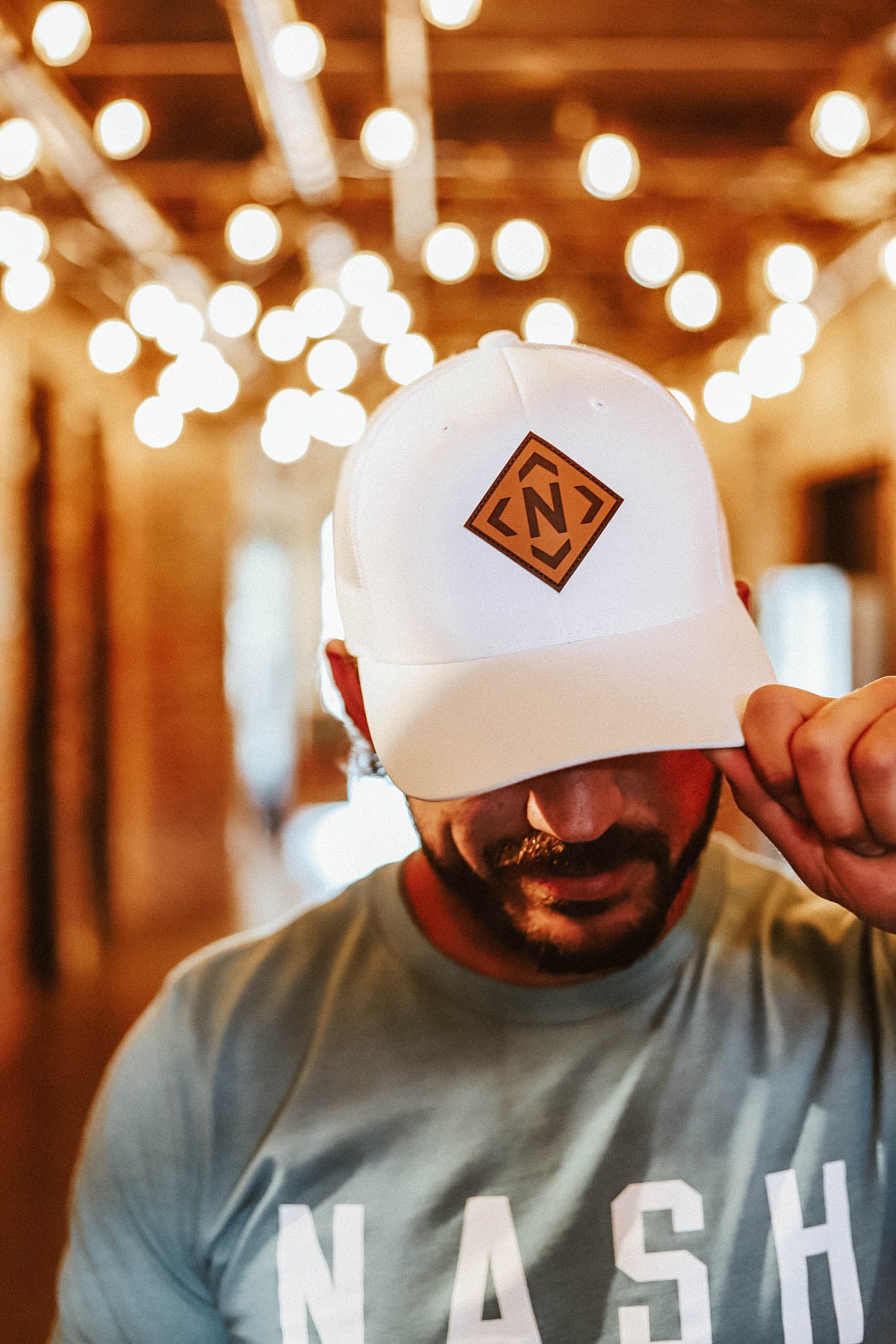 White trucker with leather iconic logo patch 