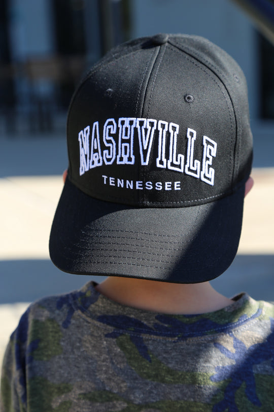 Front view of the black youth kids snapback. Arched Nashville embroidered on front. 