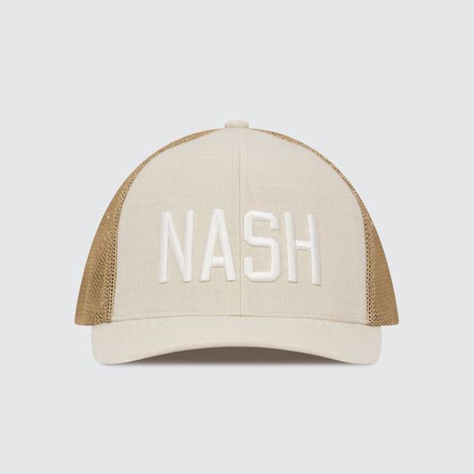 Beige and brown trucker hat with 'NASH' text on a light gray background