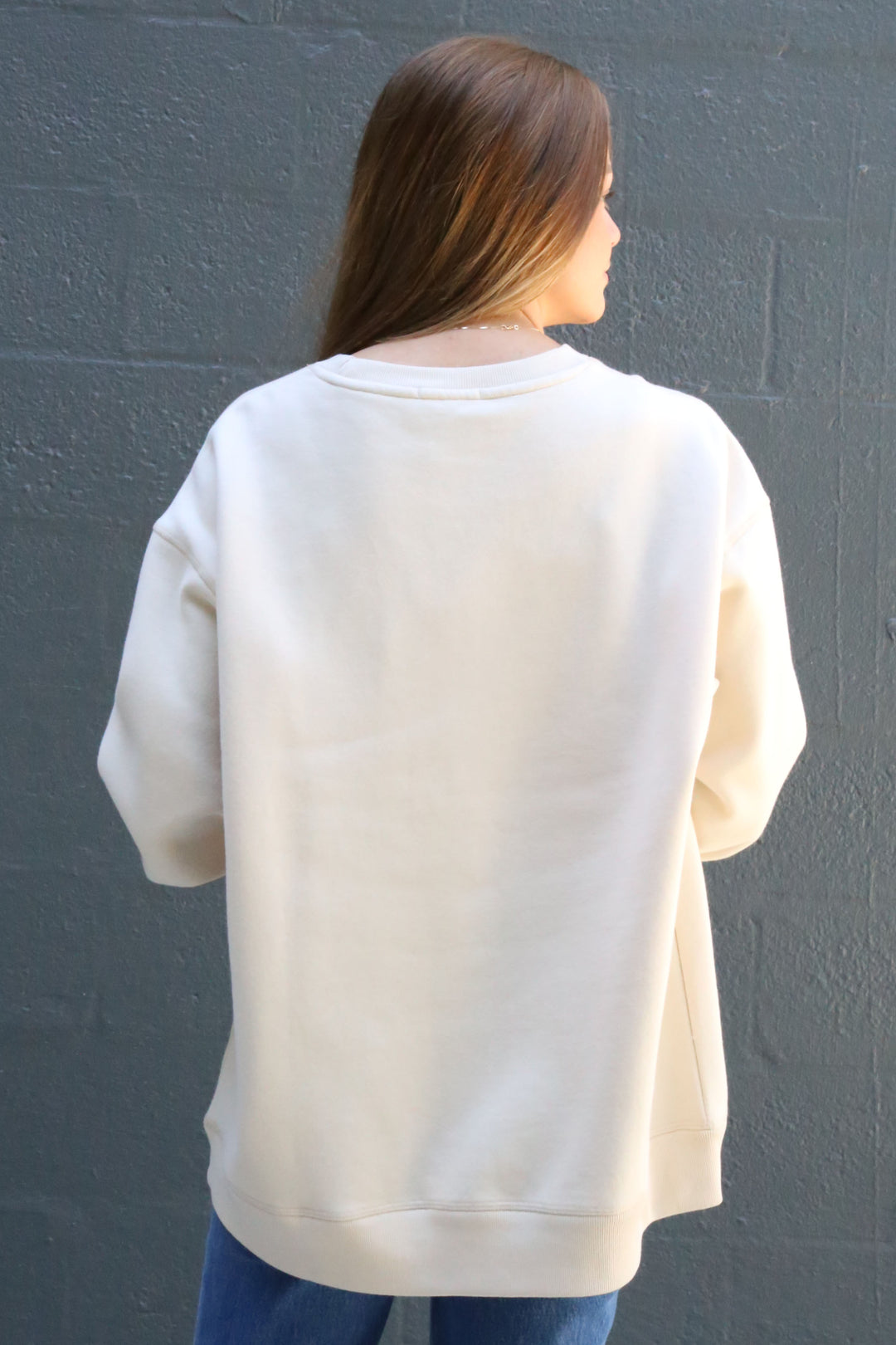 The back view of emma creneck in tapioca 