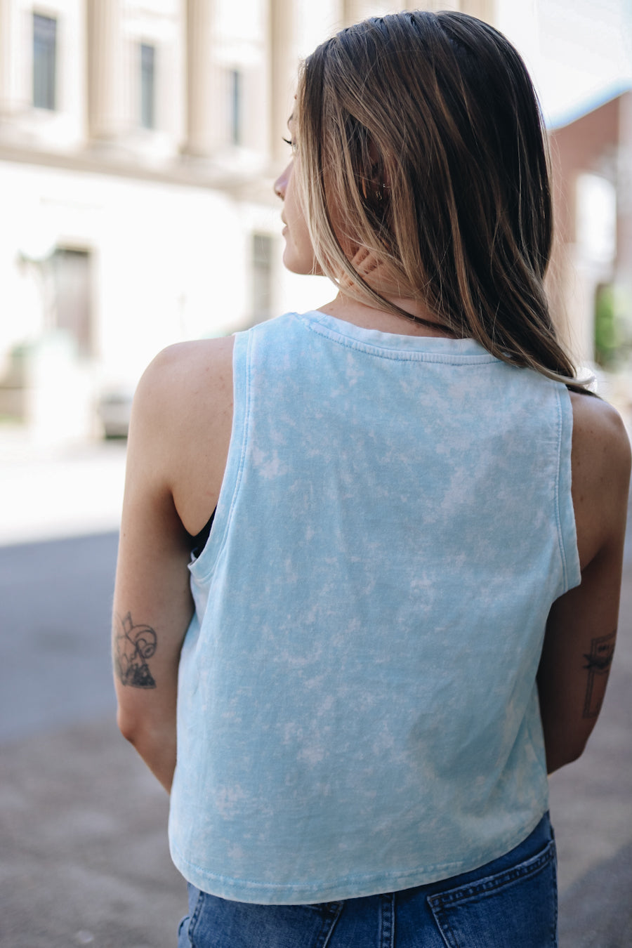 Light blue mineral wash tank with lowercase Nashville printed across the front