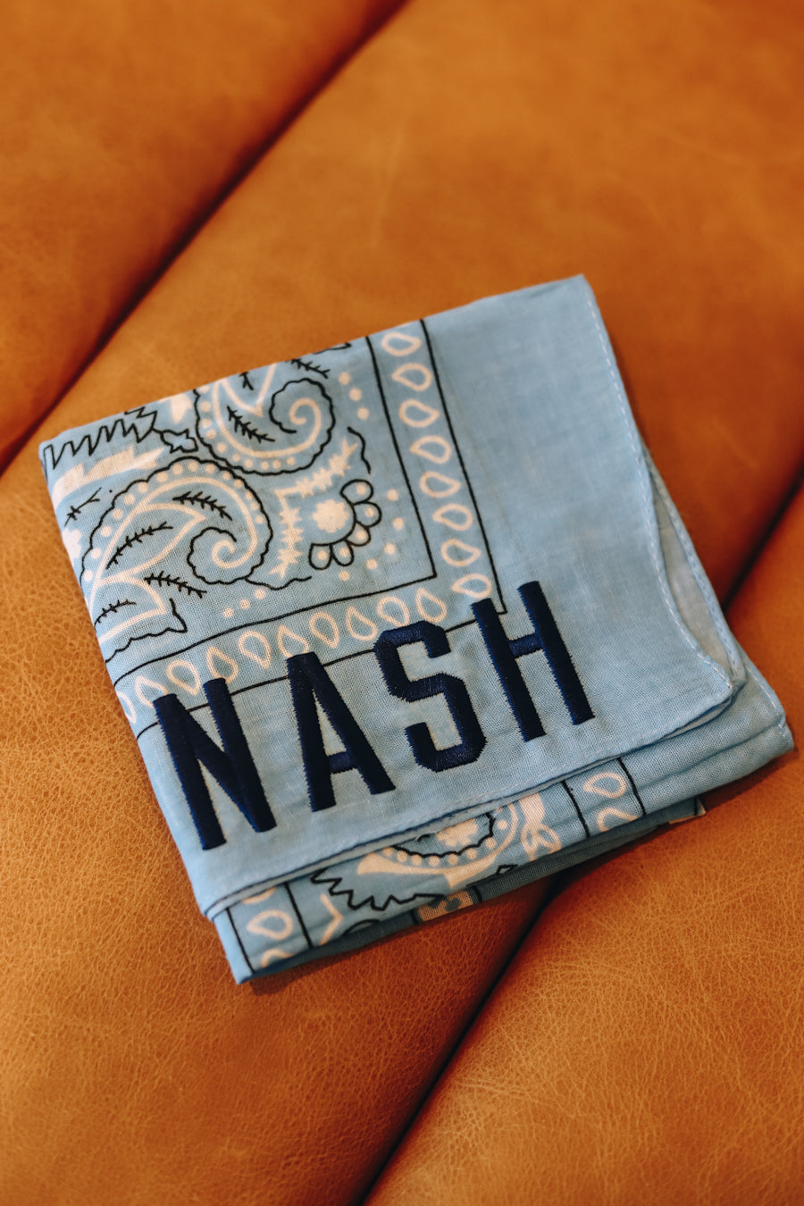 Light blue bandana with navy nash embroidery 